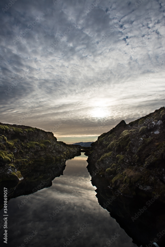 Silfra, Iceland. Where two tectonic plates meet. Water with mirror reflection
