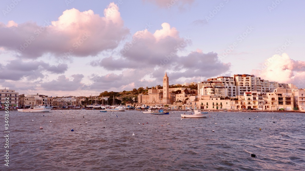 Marsaskala / Malta - January 1, 2020: Panorama of aged mediterranean town of Marsaskala, Malta.