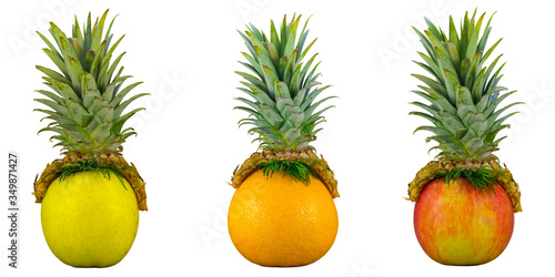 funny fruits, creative food concept. Pineapple hat on apple and orange. basis for drawing a fun human face. copy space