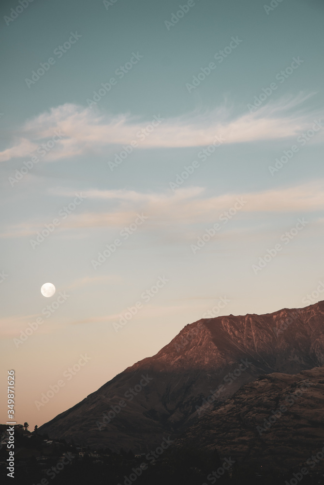 Moonrise over mountains, dusk light Moonrise over mountains, dusk light