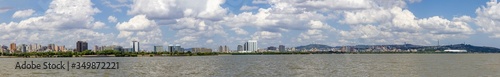 Panorama of Guaiba shore with trees and buildings
