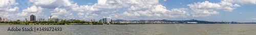 Panorama of Guaiba shore with trees and buildings © lisandrotrarbach