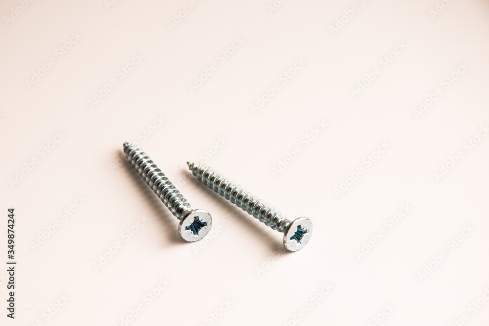 new screws on a white background