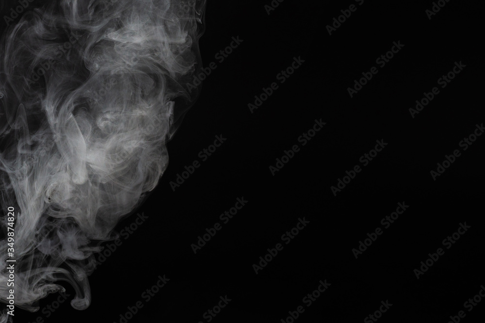 White steam on a black background. White steam on a black background.