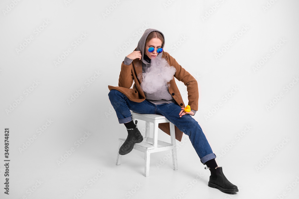 Beauty portrait of young caucasian woman enjoying the hookah Beauty portrait of young caucasian woman enjoying the hookah