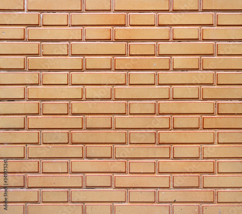 new wall background texture with clean and tidy orange bricks with outline