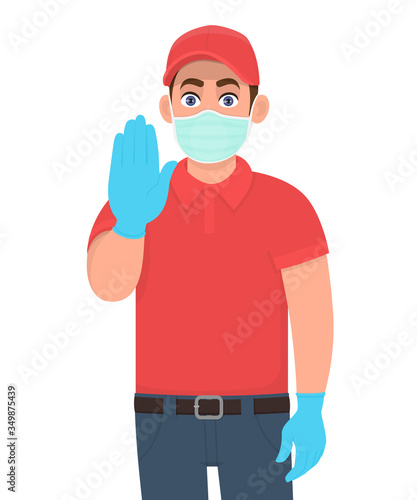 Courier or deliveryman in mask and gloves showing stop sign with palm. Person gesturing hand. Man making warning symbol. Corona virus epidemic outbreak. Door delivery service during quarantine.