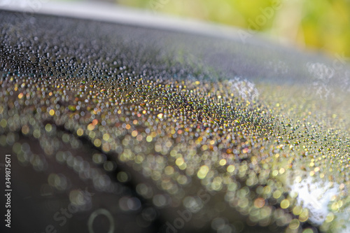 Water droplets on the windscreen after washing the car. Water droplets on the glass. Abstract and Blur water droplets background.