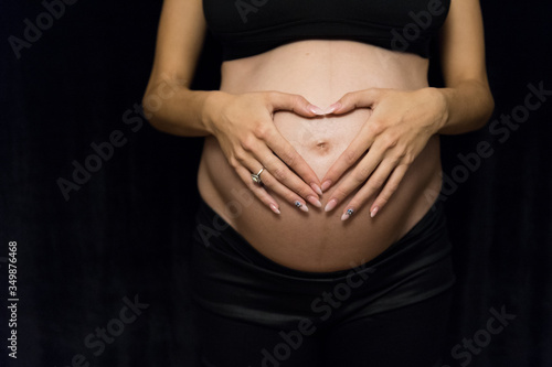 Wallpaper Mural Pregnant belly in nine mont  Torontodigital.ca