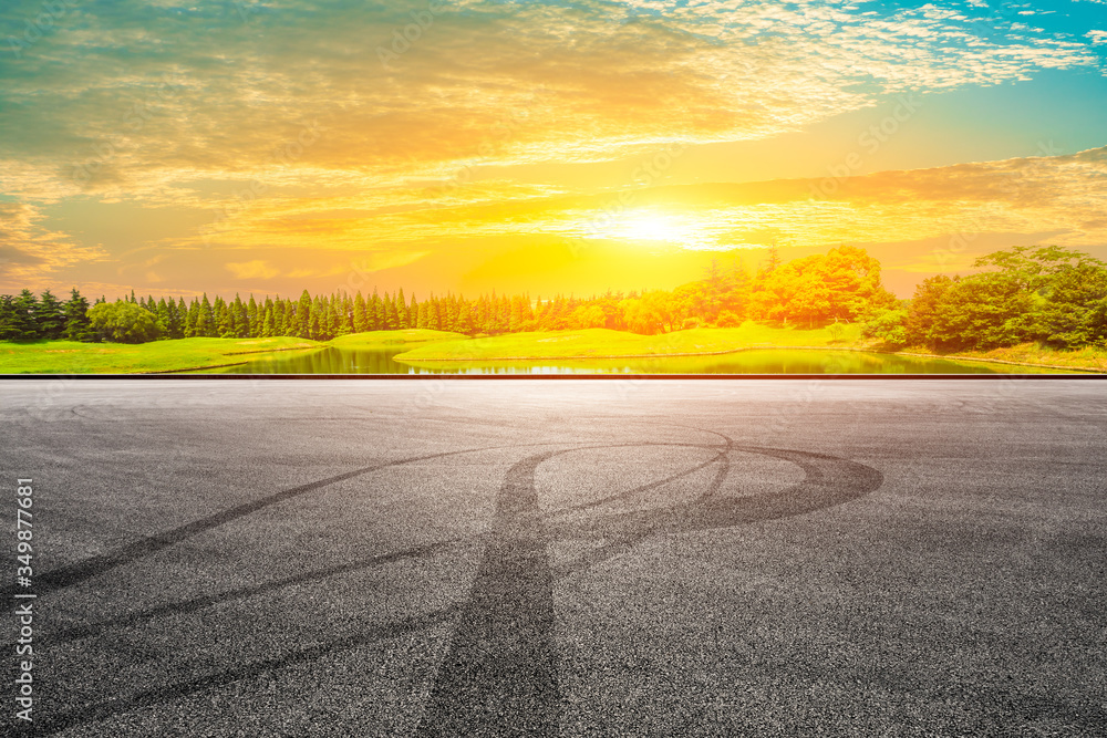 Race track road and forest with sky cloud landscape.Asphalt road background. Race track road and forest with sky cloud landscape.Asphalt road background.