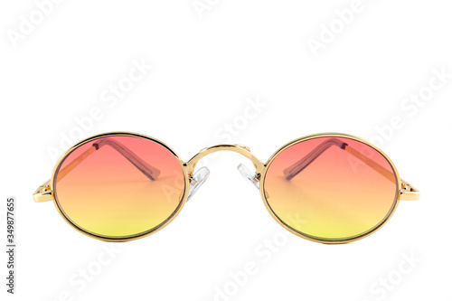 Vintage sunglasses with oval shaped gold wrap around frames and orange gradient lenses, isolated on white background, front view.