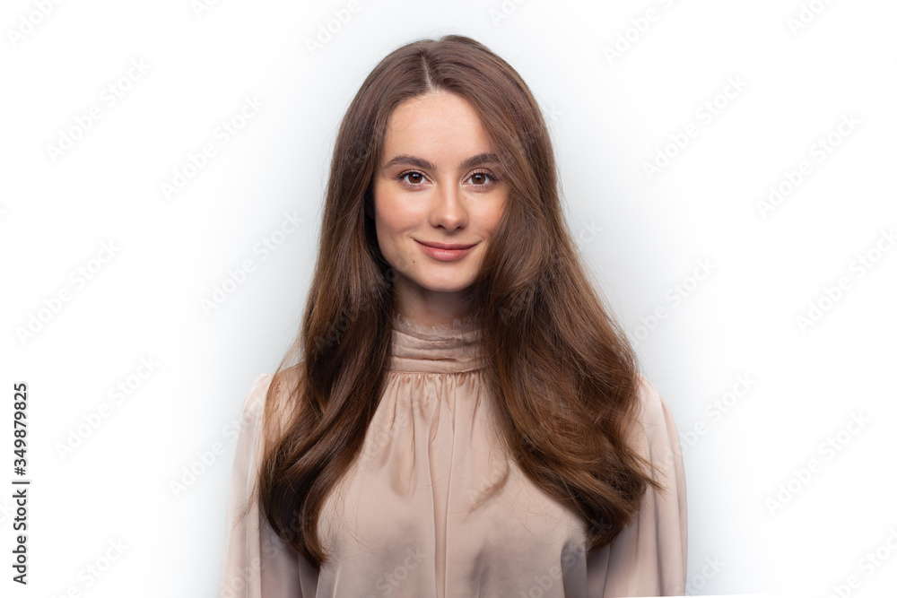 Woman portrait shot in front of white background. Woman portrait shot in front of white background.