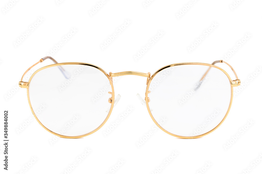 Street style reading glasses with clear lens and gold wrap around oval frames, isolated on white background, front view. Street style reading glasses with clear lens and gold wrap around oval frames, isolated on white background, front view.