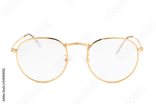 Street style reading glasses with clear lens and gold wrap around oval frames, isolated on white background, front view.