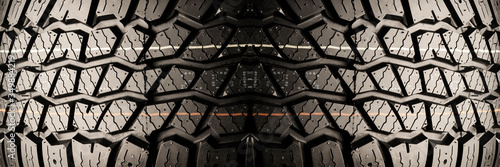 the tread of the tire, panorama. off-road wheel pattern scan close-up. texture