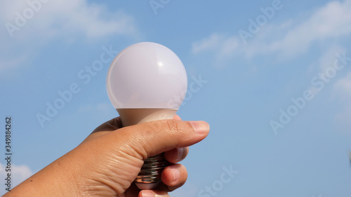 light bulb in hands