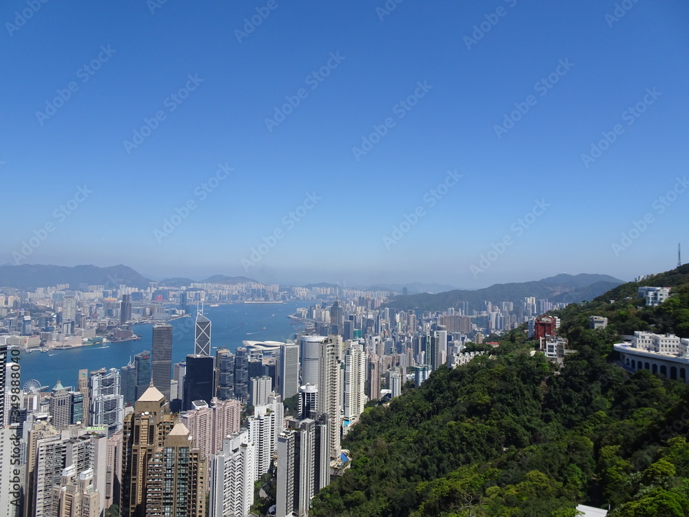 A collection of photos taken in Hong Kong. Including landscape images of skyscrapers, religious sites, skylines, and the surrounding area.