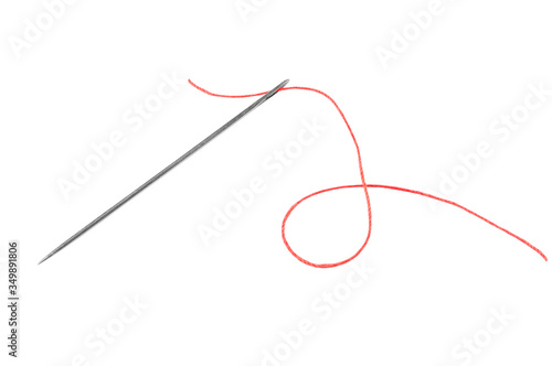 red thread and needle solated on white background