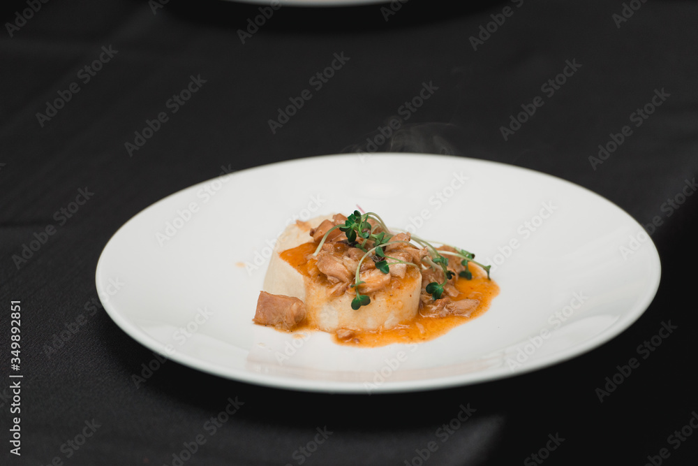 stewed rabbit on a piece of homemade bread stewed rabbit on a piece of homemade bread
