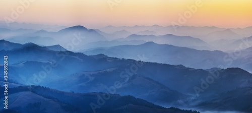 silhouettes of mountains. foggy autumn morning. Morning Carpathians © sergnester