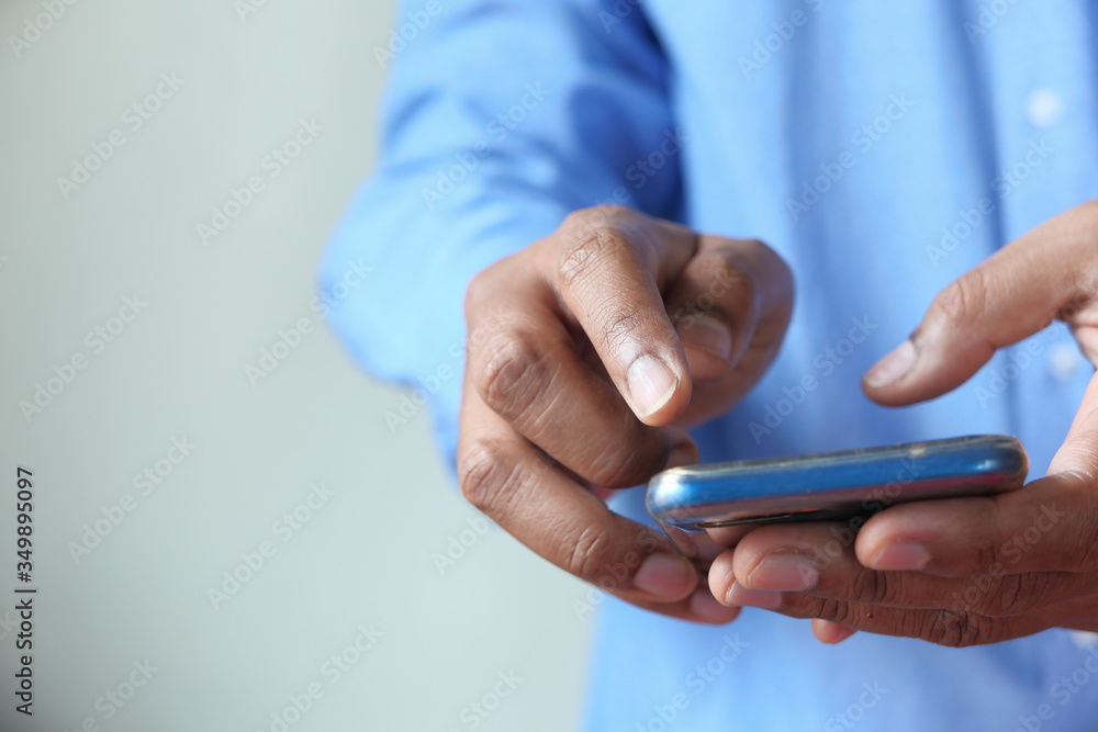 Close up of a man using mobile smart phone. Close up of a man using mobile smart phone.