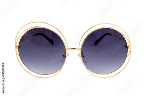 Round sunglasses with night blue gradient lenses and gold colored wrap around frames isolated on white background, front view.