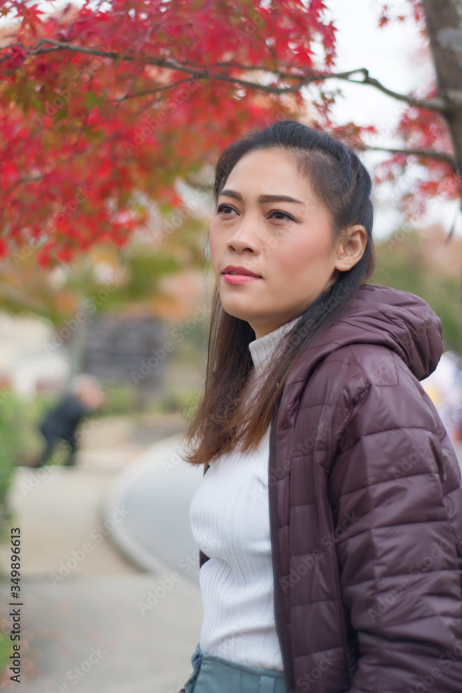 Asian woman in autumn nature background at kyoto,Japan Asian woman in autumn nature background at kyoto,Japan