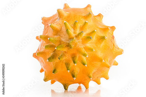 Kiwano or Horned Melon Cucumis metuliferus detailed skin shoot on white background isolated