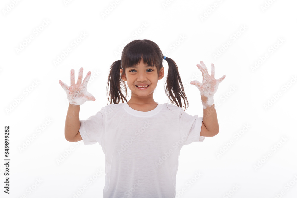 child washing hands and showing soapy palms.on white background child washing hands and showing soapy palms.on white background