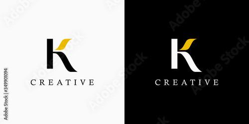 Initial Letter H and K Linked Logo. Black and Gold Lettering Calligraphy Style isolated on Double Background. Usable for Business, Beauty and Fashion Logos. Flat Vector Logo Design Template Element.