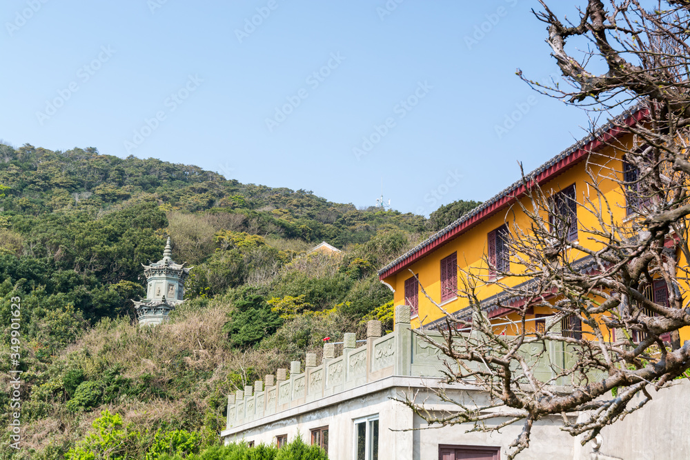 Building of Chinese buddhist temple in Mount Luojia, which lies in the Lotus Sea to the southeast of Putuo Mountain, Zhoushan, Zhejiang, the place where Bodhisattva Guanyin practiced Buddhism
