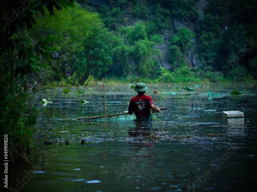 Vietnamese fisherman at Ninh Binh. Vietnam, Asia
