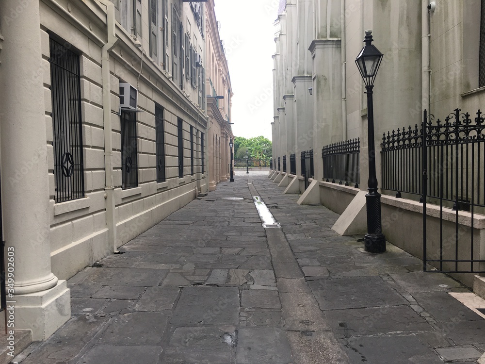 An alley in New Orleans on a cloudy day.