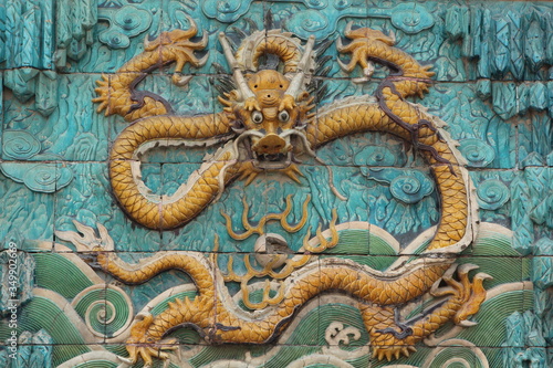 chinese dragon statue on wall