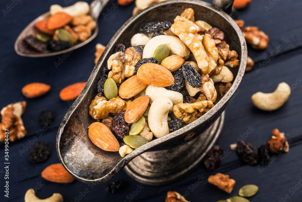 Mixed nuts on wooden board background Mixed nuts on wooden board background