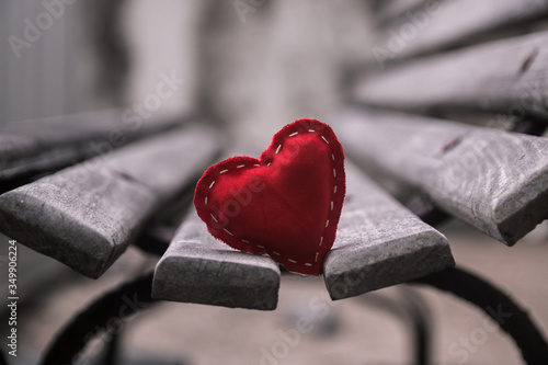 Romantic heart made of fabric on bench