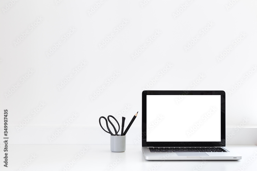 Laptop at trendy home office and books around, Homeschooling concept. Creative desk. Laptop at trendy home office and books around, Homeschooling concept. Creative desk.