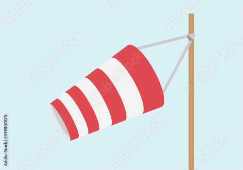 Medidor de velocidad de viento de color blanco y rojo.