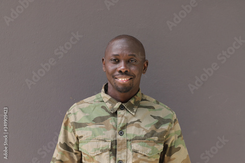 Soldier Portrait Face, Black African Man wearing camouflage uniform