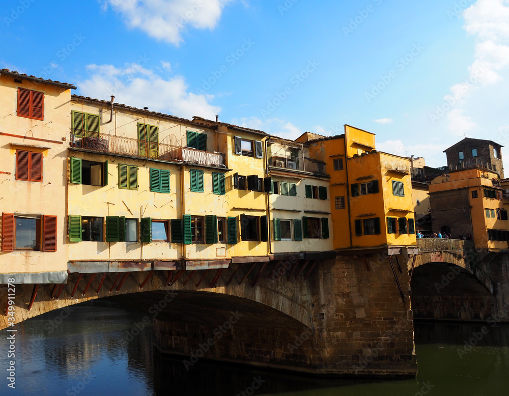 View of the Ponte Vecchio bridge. It is a medieval bridge over the Arno River, in Florence, Italy. View of the Ponte Vecchio bridge. It is a medieval bridge over the Arno River, in Florence, Italy.