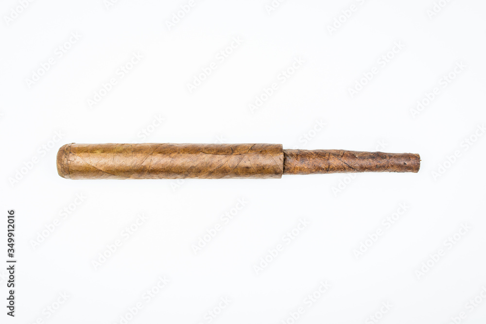 Two best cigars from twisted sheets on white background. Two best cigars from twisted sheets on white background.