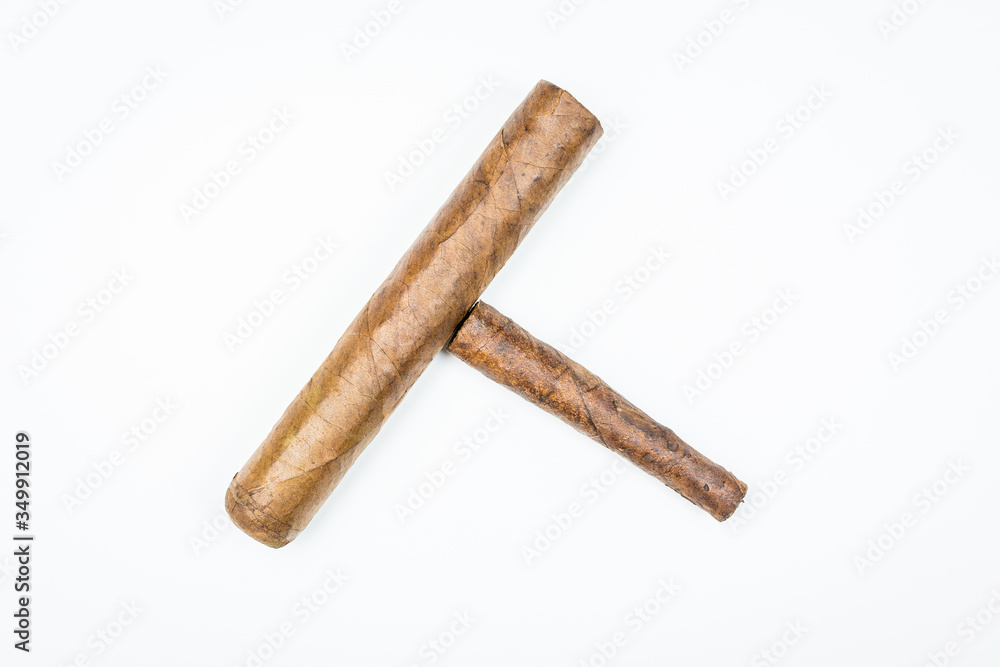 Two best cigars from twisted sheets on white background. Two best cigars from twisted sheets on white background.