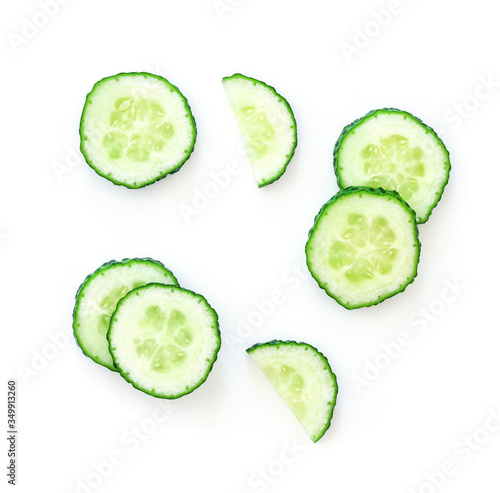 Set of slice of cucumber isolated on white background.