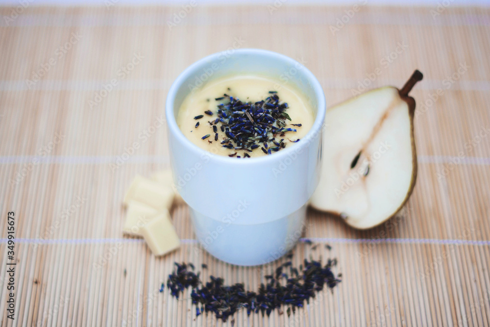 White drinking chocolate with pear and lavender flovers White drinking chocolate with pear and lavender flovers