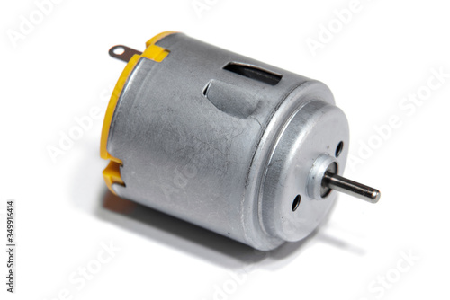 Small DC motor for DIY toys isolated on white background