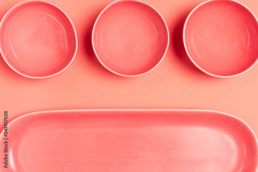 Set of colored bowls and long plate Set of colored bowls and long plate