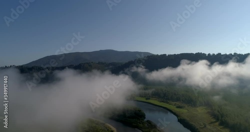 Wallpaper Mural AERIAL VIEW: morning thick fog over a mountain river. white clouds close-up, clear water and green meadows and beautiful river banks. wide panorama. concept of ecology and environmental protection Torontodigital.ca