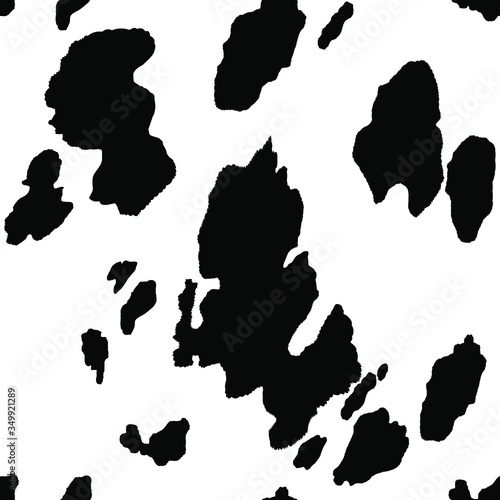 Seamless cow pattern with black spots on a white background. Vector animal print textured pattern