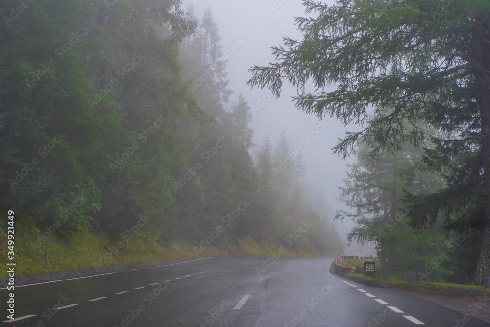 Fototapeta premium Scenic foggy road at Grossglockner mountain pass, Austria