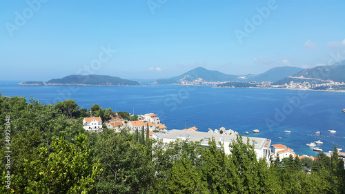 blue Adriatic sea and green hills near Budva and Becici - resort of Montenegro